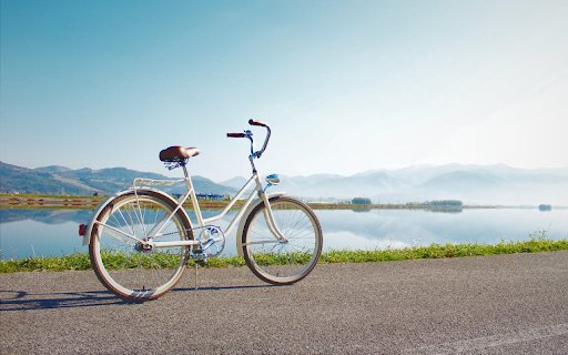 White bicycle on the road next  from Chrome web store to be run with OffiDocs Chromium online