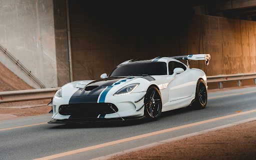 White Sports Car on Asphalt Road  from Chrome web store to be run with OffiDocs Chromium online