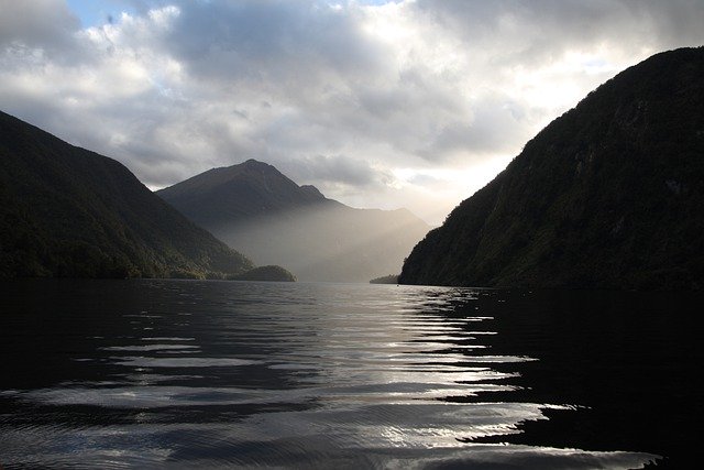 Скачать бесплатно морские горы новая зеландия солнечные лучи бесплатное изображение для редактирования с помощью бесплатного онлайн-редактора изображений GIMP