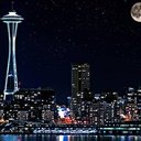 Orizzonte di Seattle. La città nella schermata delle luci notturne per l'estensione del negozio web Chrome in OffiDocs Chromium