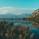 serene lake nestled among green trees  screen for extension Chrome web store in OffiDocs Chromium
