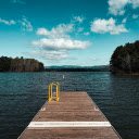 Serene Wooden Dock Overlooking Calming Lake View  screen for extension Chrome web store in OffiDocs Chromium