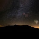 Silhouette of a Mountain under a Starry Night Sky  screen for extension Chrome web store in OffiDocs Chromium