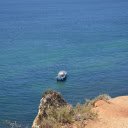Small boat and blue ocean  screen for extension Chrome web store in OffiDocs Chromium