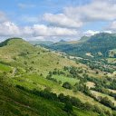 Small road through green grass hills  screen for extension Chrome web store in OffiDocs Chromium