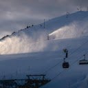 Snow Cannons Producing Snow on a Mountain Slope  screen for extension Chrome web store in OffiDocs Chromium