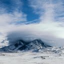 snow capped peak of Mount Mactiro shrouded in mist  screen for extension Chrome web store in OffiDocs Chromium