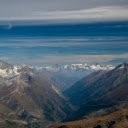 Snow Covered Mountains Under Blue Sky  screen for extension Chrome web store in OffiDocs Chromium