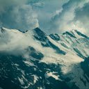 Snow Covered Mountain Under Cloudy Sky  screen for extension Chrome web store in OffiDocs Chromium