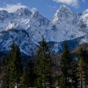 Snowy mountains and coniferous forests  screen for extension Chrome web store in OffiDocs Chromium