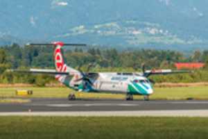 Free download SP-EQE / Eurolot / De Havilland Canada DHC8 402Q Dash8 / Ljubljana Airport (LJLJ) free photo or picture to be edited with GIMP online image editor