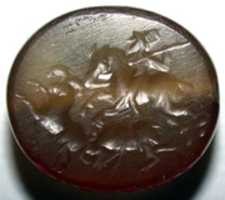 Free download Stamp seal and modern impression: hunter on horse attacking rams free photo or picture to be edited with GIMP online image editor