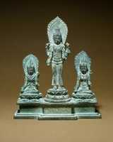 Free download Standing Four-Armed Avalokiteshvara Flanked by Tara and Bhrikuti(?) free photo or picture to be edited with GIMP online image editor