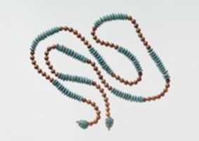 دانلود رایگان String of Beads with Feline-head Amulets عکس یا عکس رایگان برای ویرایش با ویرایشگر تصویر آنلاین GIMP