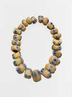 Free download String of twenty-three glass eye beads free photo or picture to be edited with GIMP online image editor