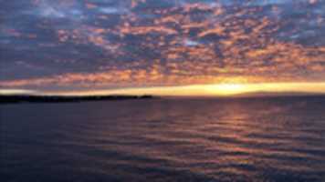 Free download Sunrise out at sea free photo or picture to be edited with GIMP online image editor