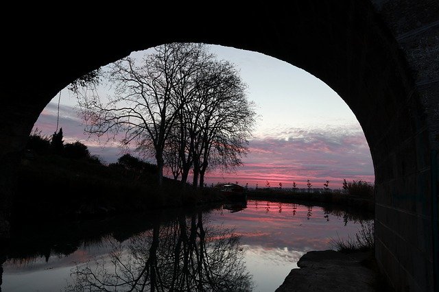 Baixe gratuitamente a imagem gratuita da arquitetura do canal du midi do pôr do sol para ser editada com o editor de imagens on-line gratuito do GIMP