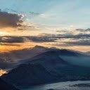 sunset from a mountain peak overlooking a bustling city  screen for extension Chrome web store in OffiDocs Chromium