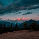 sunset over distant majestic snow capped mountains  screen for extension Chrome web store in OffiDocs Chromium