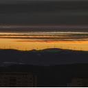 Sunset Over Windmills in Graz, Austria  screen for extension Chrome web store in OffiDocs Chromium