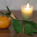 Tangerines next to scented candles  screen for extension Chrome web store in OffiDocs Chromium