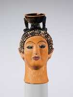 Free download Terracotta aryballos (perfume bottle) in the shape of a womans head free photo or picture to be edited with GIMP online image editor