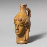 Free download Terracotta jug in the form of Dionysos free photo or picture to be edited with GIMP online image editor