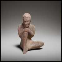 Free download Terracotta statuette of a seated African (known as Ethiopian) boy free photo or picture to be edited with GIMP online image editor