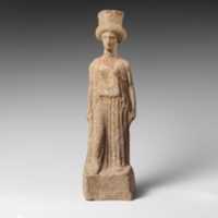 Free download Terracotta statuette of a standing woman free photo or picture to be edited with GIMP online image editor