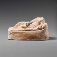 Free download Terracotta statuette of a woman reclining on a couch free photo or picture to be edited with GIMP online image editor