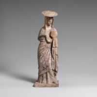 Free download Terracotta statuette of a woman wearing a hat and holding a fan free photo or picture to be edited with GIMP online image editor