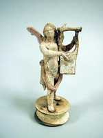 Free download Terracotta statuette of Eros playing a lyre free photo or picture to be edited with GIMP online image editor