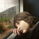 The boy watched the rain by the window  screen for extension Chrome web store in OffiDocs Chromium