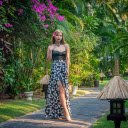 The girl stood under the bougainvillea tree  screen for extension Chrome web store in OffiDocs Chromium