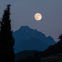 The moon hangs over the mountain top  screen for extension Chrome web store in OffiDocs Chromium