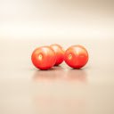 Three tomatoes with stems removed  screen for extension Chrome web store in OffiDocs Chromium
