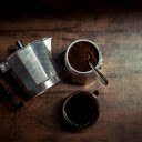 Top View of a Coffee Maker and a Cup of Coffee  screen for extension Chrome web store in OffiDocs Chromium