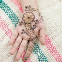 Top View of a Hand with a Henna Tattoo  screen for extension Chrome web store in OffiDocs Chromium