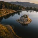 Tranquil Lake with Scenic Island at Sunset  screen for extension Chrome web store in OffiDocs Chromium
