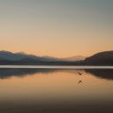 Tranquil Sunset Over Mountain Lake  screen for extension Chrome web store in OffiDocs Chromium