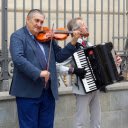 Two men performing on the street  screen for extension Chrome web store in OffiDocs Chromium