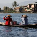 Two people rowing a boat by the river  screen for extension Chrome web store in OffiDocs Chromium