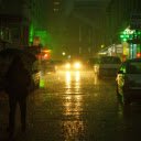 Umbrella Walking on Sidewalk during Night Time  screen for extension Chrome web store in OffiDocs Chromium
