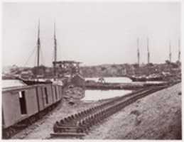 Free download Unloading Supplies for U.S. Military Railroad opposite Richmond, Virginia free photo or picture to be edited with GIMP online image editor