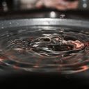 Water Droplets Falling into Rippled Surface  screen for extension Chrome web store in OffiDocs Chromium