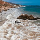 Waves crashing on rocks  screen for extension Chrome web store in OffiDocs Chromium