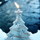 White Christmas Tree Candle: A Symbol of Warmth and Serenity  screen for extension Chrome web store in OffiDocs Chromium