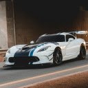 White Sports Car on Asphalt Road  screen for extension Chrome web store in OffiDocs Chromium