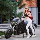Woman and motorbike  screen for extension Chrome web store in OffiDocs Chromium
