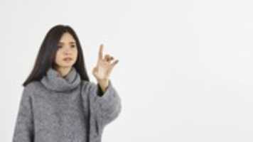 Free download woman-with-forefinger-raised free photo or picture to be edited with GIMP online image editor